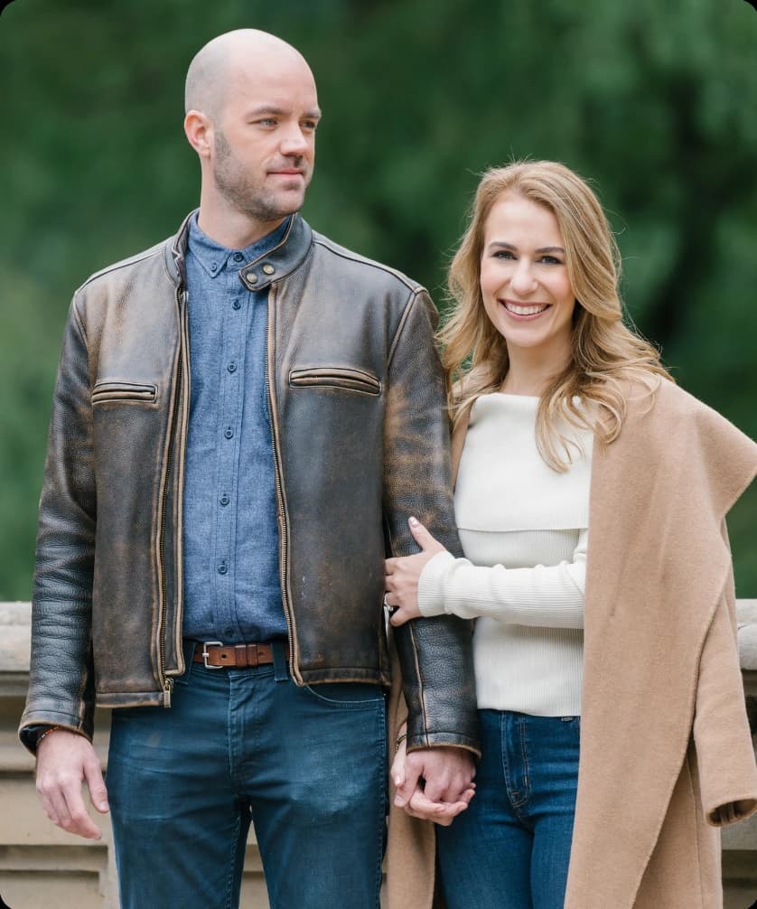 Happy couple holding hands