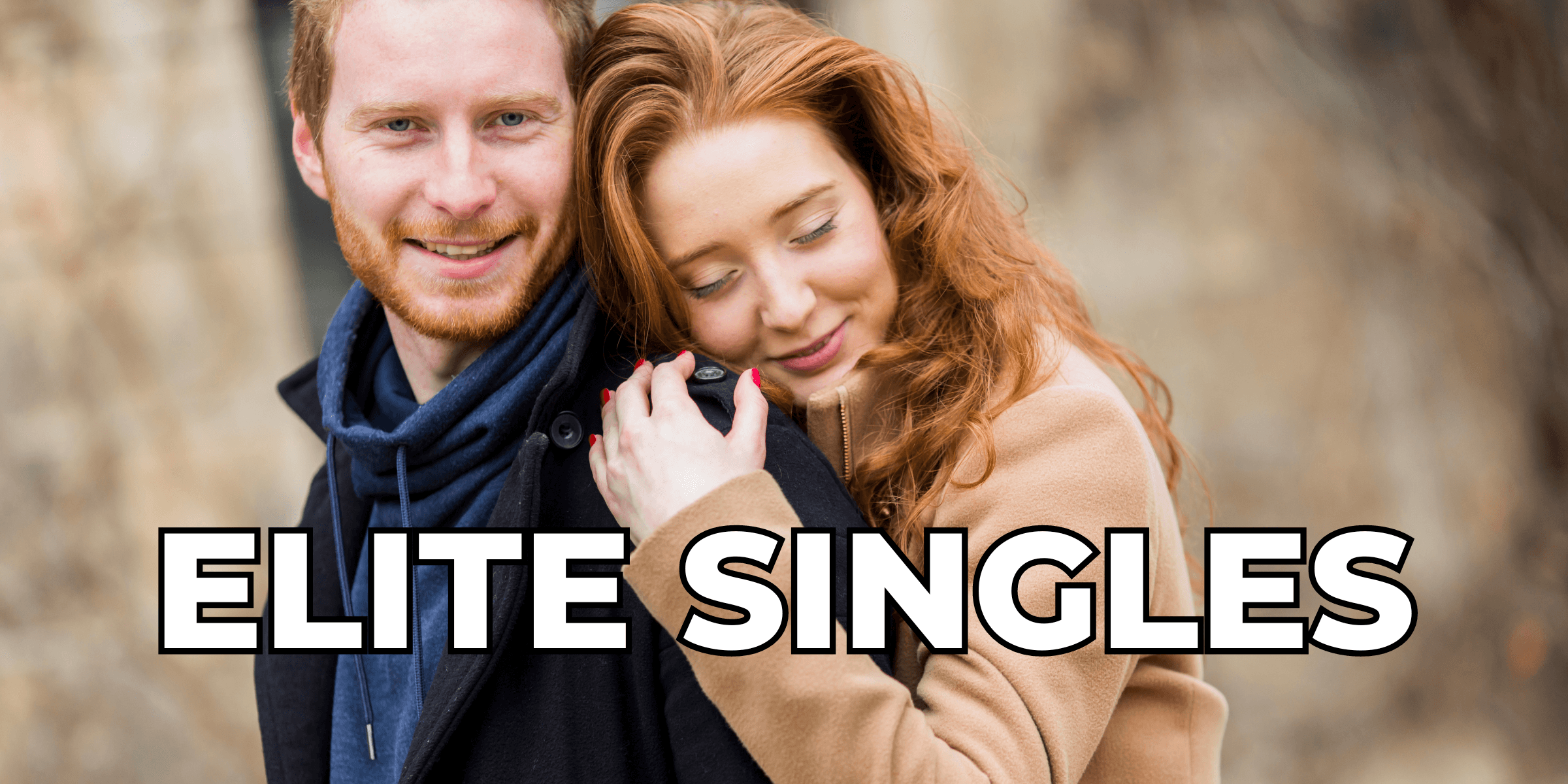 Image for Elite Singles matchmaking service with a red-headed man and woman holding each other smiling.
